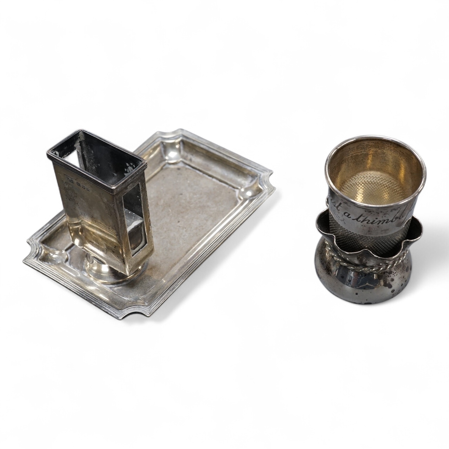 A George V silver Mappin and Webb match box holder ashtray, 12.6cm, a just a thimbleful sterling spirit tit, novelty 925 salt, modelled as a sack.